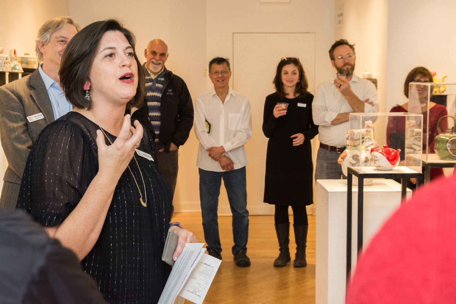 Stefanie Kirkland, Director of Exhibitions, speaks at the event kickoff
